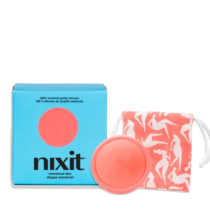 Nixit reusable menstrual disc in pink silicone with its box and pouch